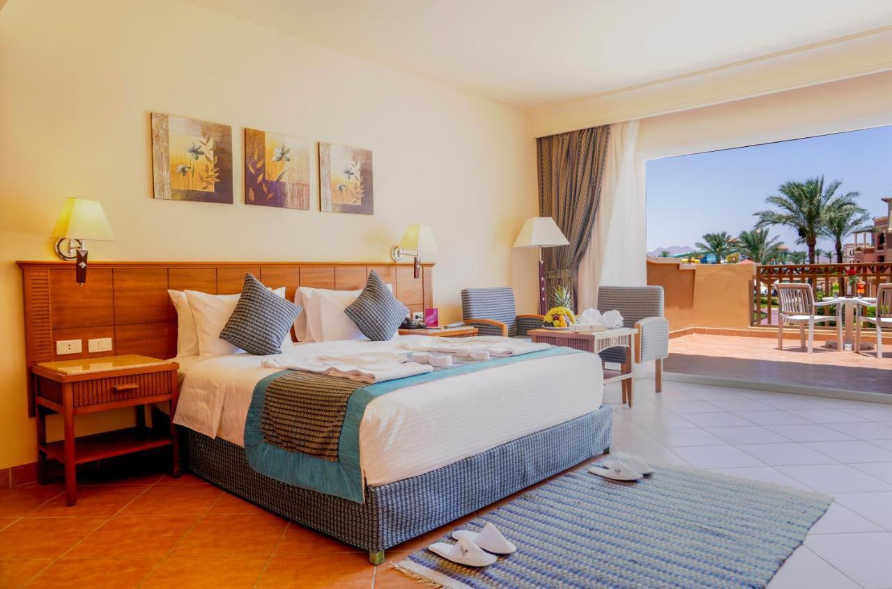 Charmillion Club Aquapark Hotel ชาร์มเอลชีค ภายนอก รูปภาพ A room at the Hilton Sharm El Sheikh