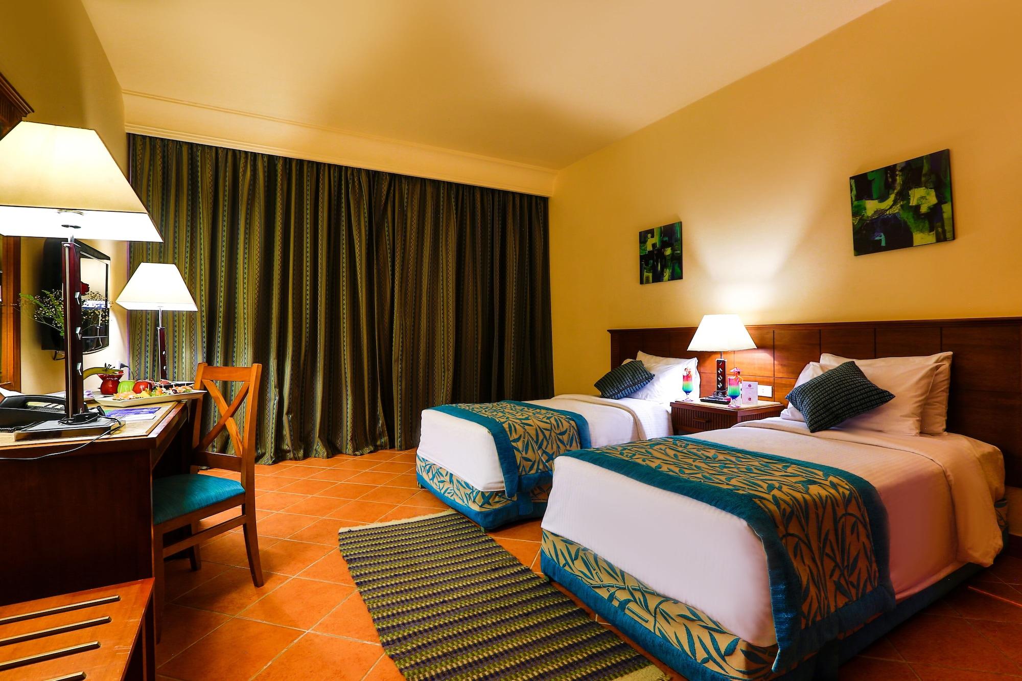 Charmillion Club Aquapark Hotel ชาร์มเอลชีค ภายนอก รูปภาพ A room at the hotel