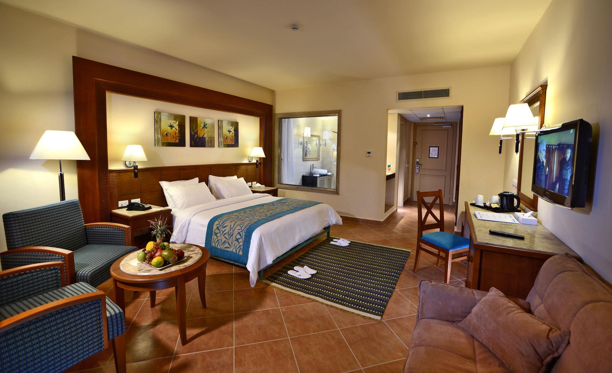 Charmillion Club Aquapark Hotel ชาร์มเอลชีค ภายนอก รูปภาพ A room at the Hilton Sharm El Sheikh